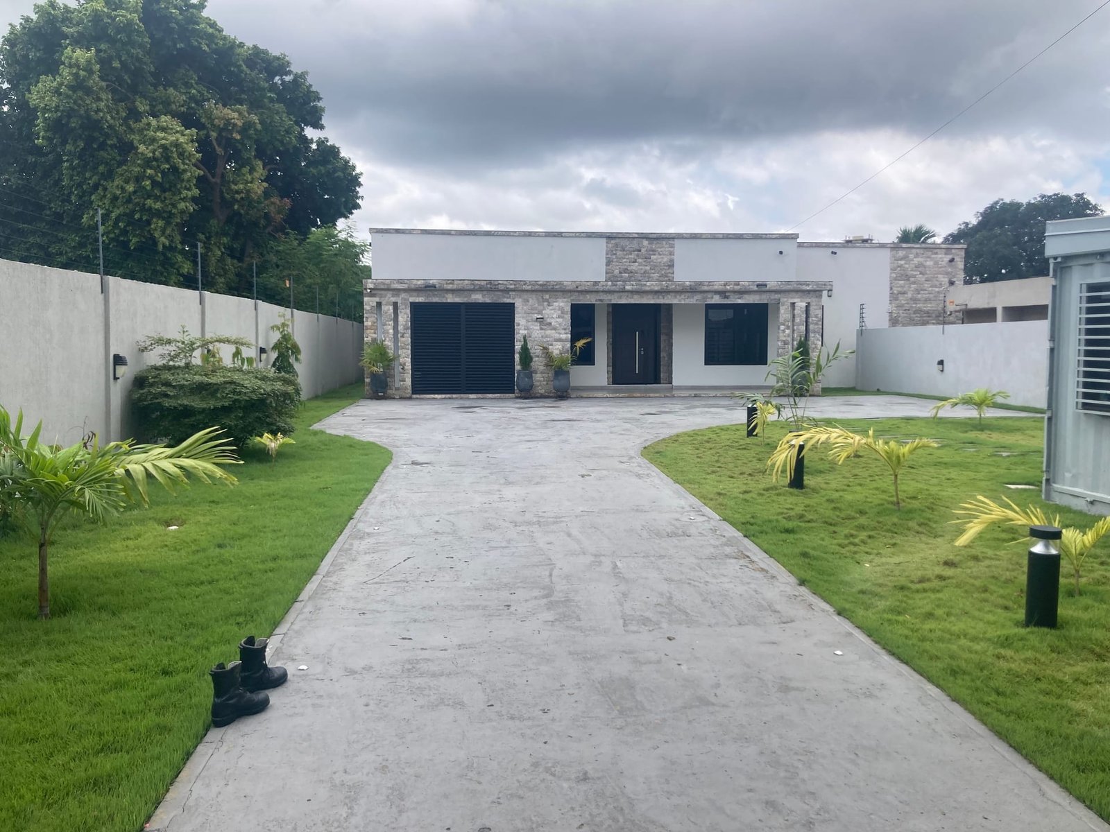 Completed paving and landscaping works at a residential property in Abotsi Street, Accra