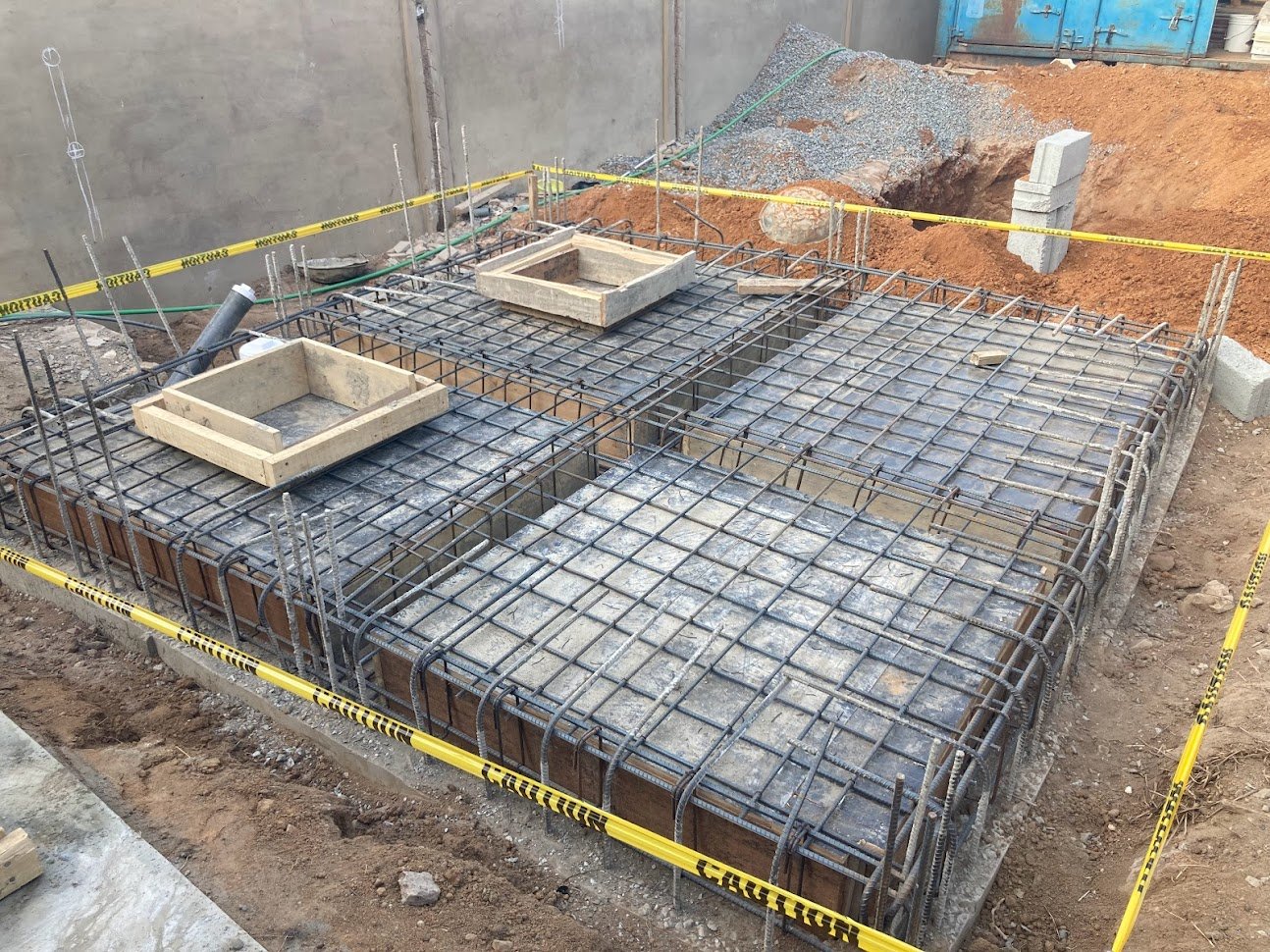 Excavation and concrete works for a septic tank construction on a Punctum Construction project