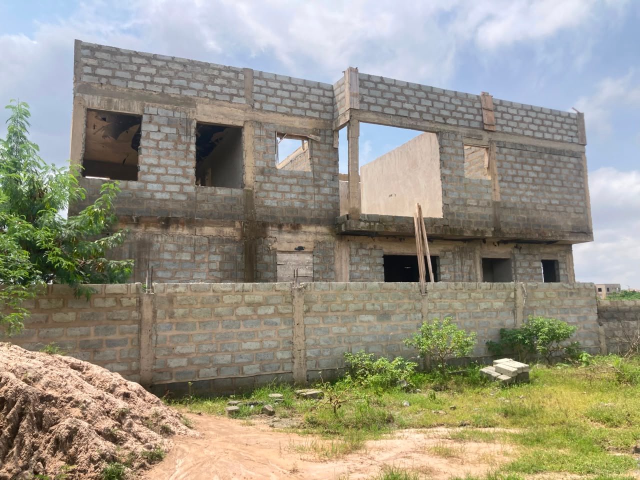 Twin residential houses under construction at King's Cottage Estate, Accra