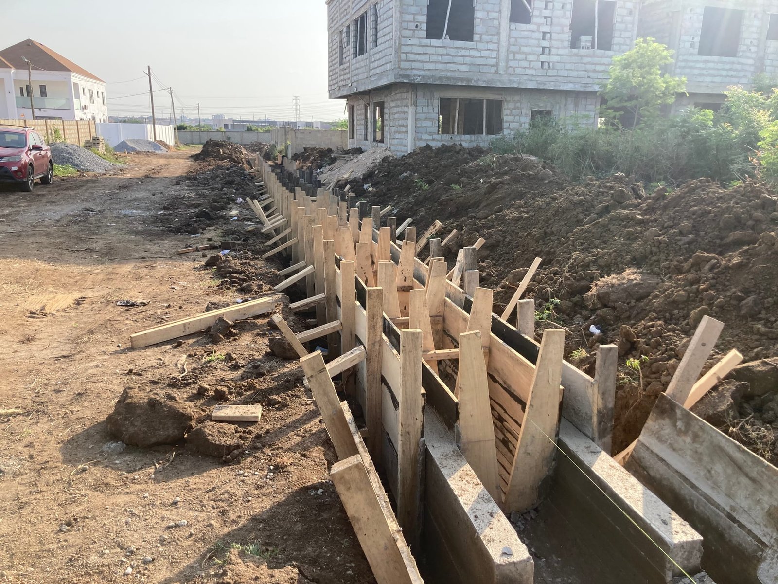 Reinforced concrete U-drain channel construction for stormwater management at Borteyman, Accra